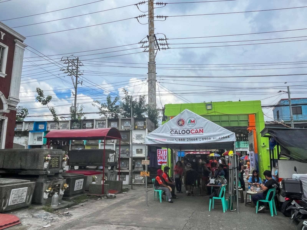 Community gathering at the cemetery